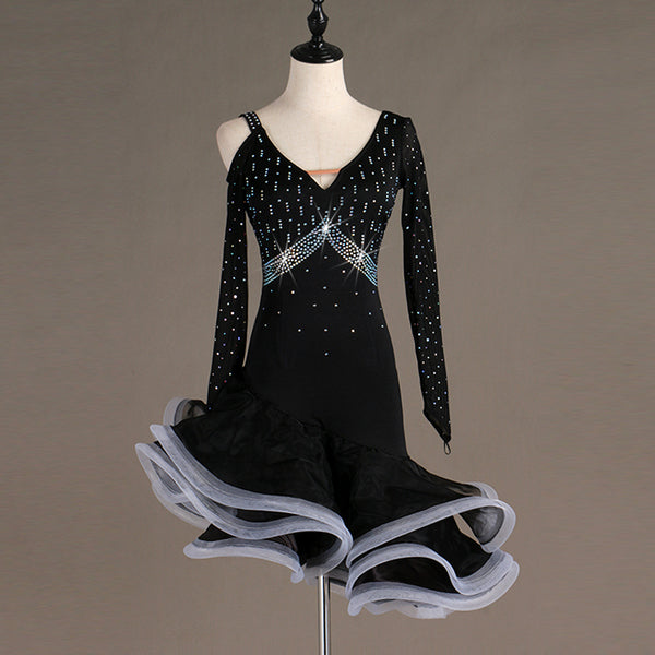 Black latin dance dress with crystal chevron bodice and white edged organza ruffle skirt