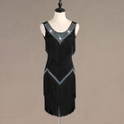 Black latin dance dress with crystal edged neckline and full black tassel fringe skirt