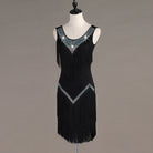 Black tassel fringe latin dance dress angled view showing the stoned hip chevron