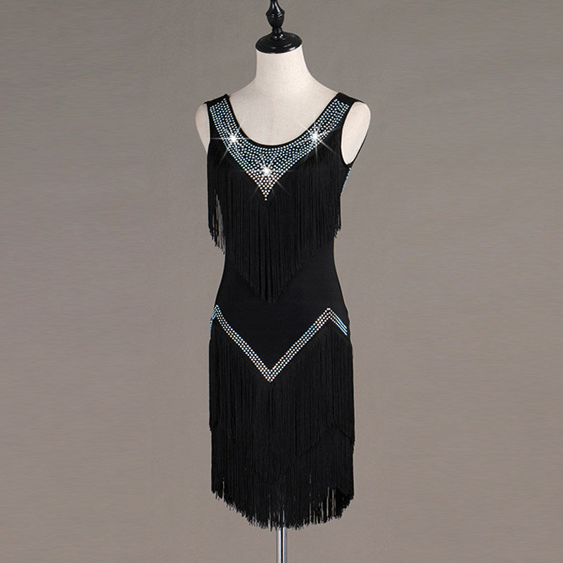 Black tassel fringe latin dance dress angled view showing the stoned hip chevron