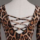 Close view of the cord lacing across the open back on leopard print