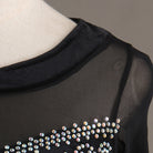 Close view of the mesh yoke and the crystal scroll stonework
