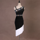 Black latin dance dress rear view with the white diagonal fringe hem