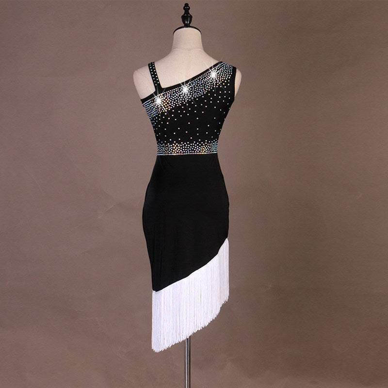 Black latin dance dress rear view with the white diagonal fringe hem