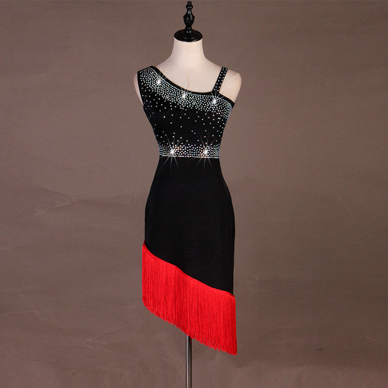 Black latin dance dress with red diagonal fringe hem and stoned bodice