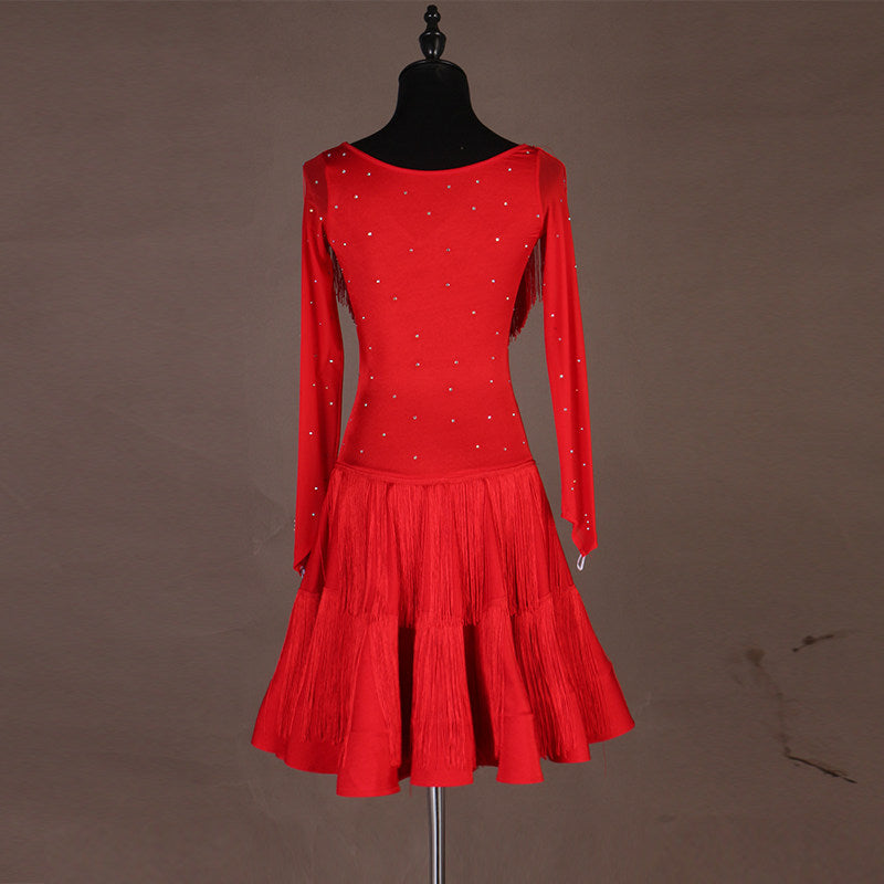 Red latin dance dress front view showing the long sleeves and fringe panel