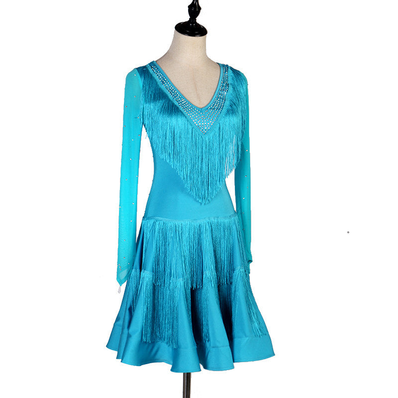 Turquoise latin dance dress with fringe chest panel and pleated skirt