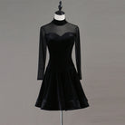 Black velvet latin dance dress with sheer mesh high neck yoke and flared skirt