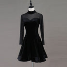 Black velvet latin dance dress angled view showing the sweetheart velvet line