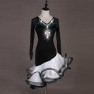 Black latin dance dress side view with the white and black organza curls