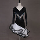 Black latin dance dress rear view showing the V back and ruffle skirt