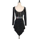 Black latin dance dress front view showing the pointed stoned hem