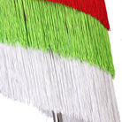 Close view of the green, red and white fringe bands at the hem