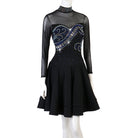 Black latin dance dress with crystal scroll under a mesh yoke and flared hem