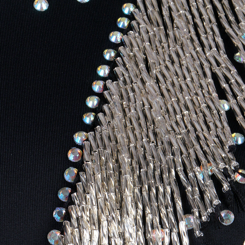 Close view of the silver bugle bead fringe and rhinestone edging