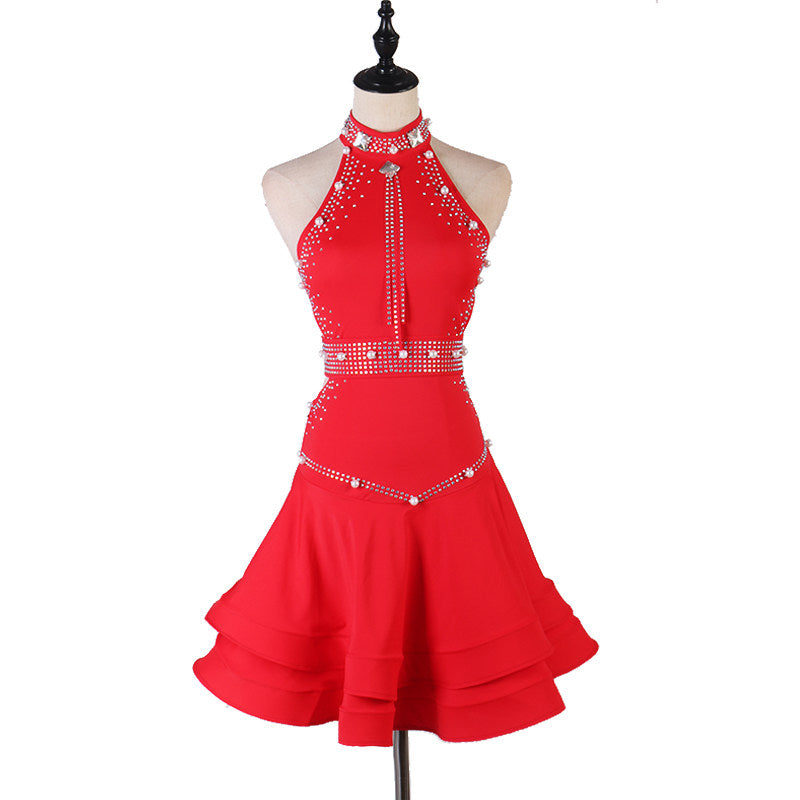 Red latin dance dress with pearl studded collar and banded chest straps