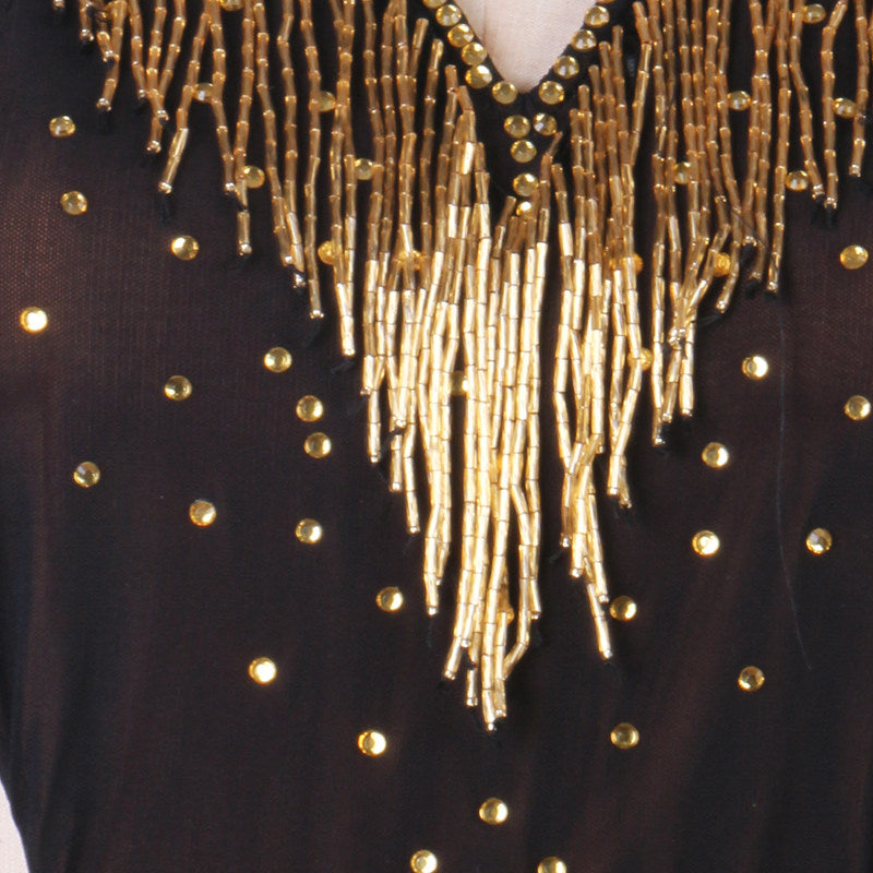 Close view of the hand hung gold bugle beads and stud scatter