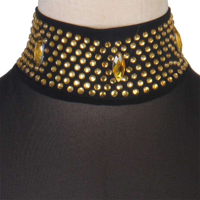 Close view of the wide gold studded collar band on mesh