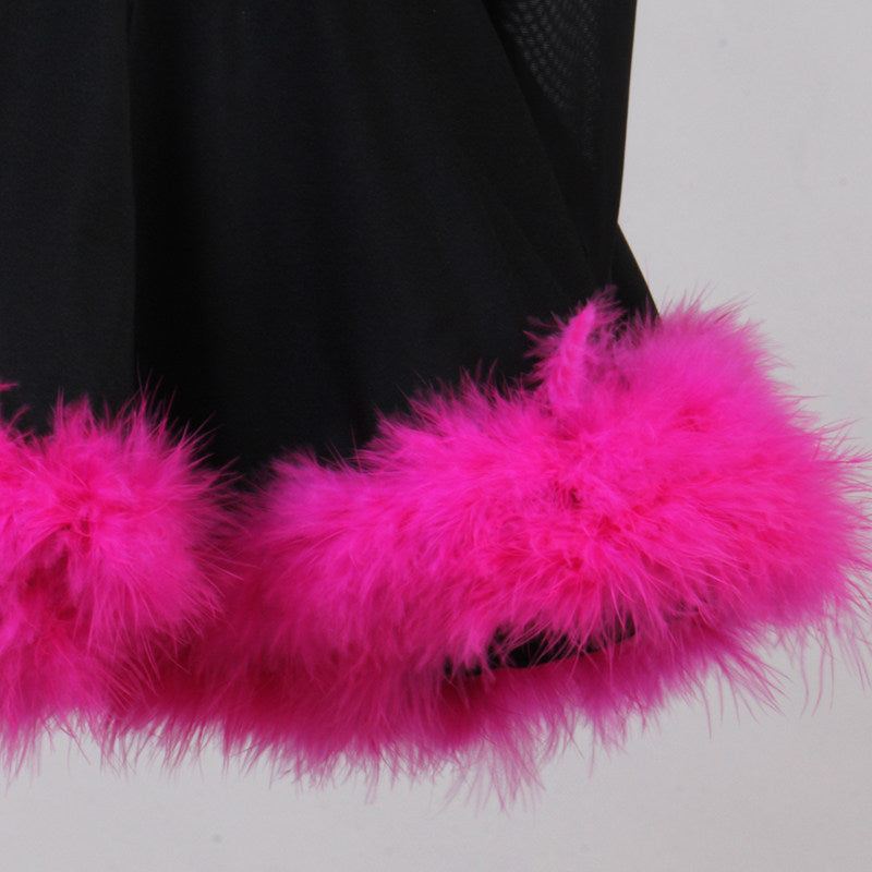 Close view of the pink marabou feather trim at the hem
