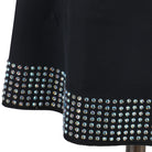 Close view of the stone studded band around the hem