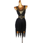 Black latin dance dress with gold bead fringe and studded belt over a ragged hem