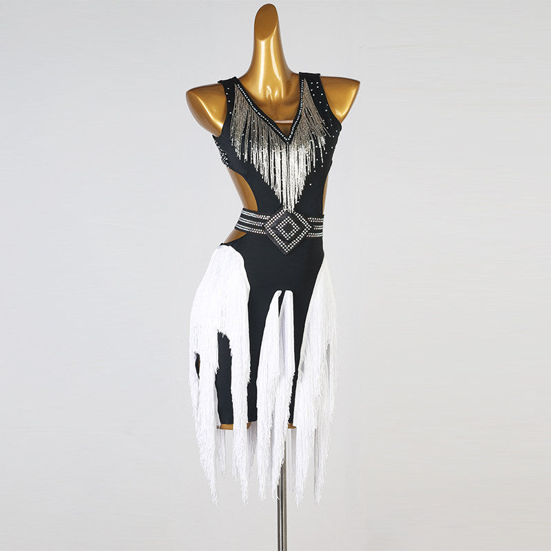Black and white latin dance dress with gold bead fringe and studded belt