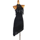 Black latin dance dress with sequin fringe under a mesh yoke and diagonal hem