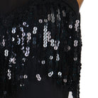 Close view of the black sequin fringe strands