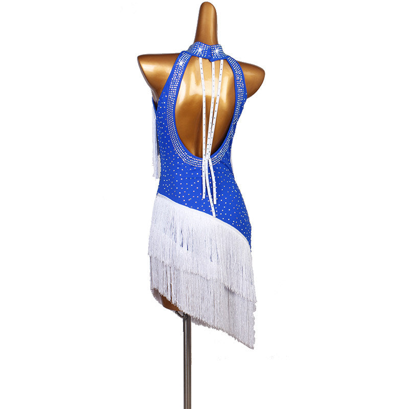 Blue and white latin dance dress rear view showing the open back and fringe