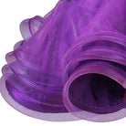 Close view of the purple curled organza ruffle layers