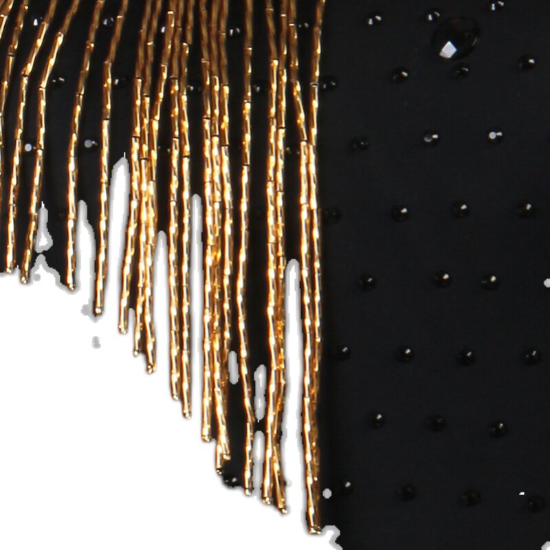 Close view of the gold bugle fringe against the stoned bodice