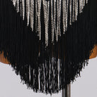 Close view of the black and silver fringe rows overlapping