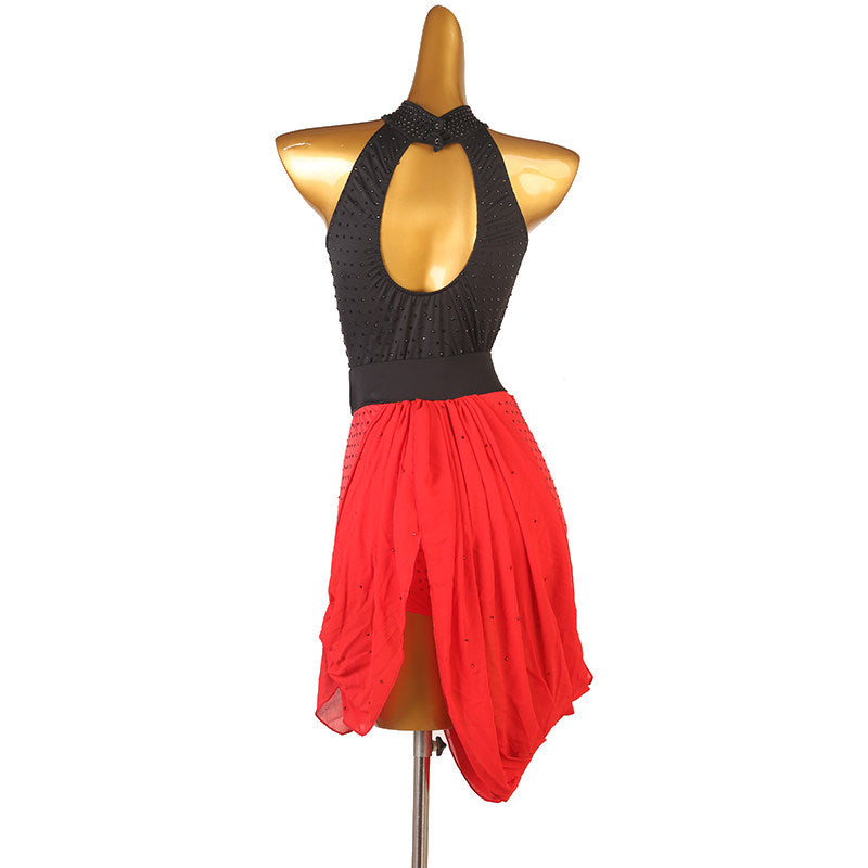 Black latin dance dress with red gathered drape skirt and tassel tie