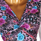 Close view of the knotted front on the rose leopard print bodice