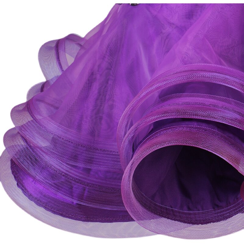 Close view of the purple curled organza ruffle layers