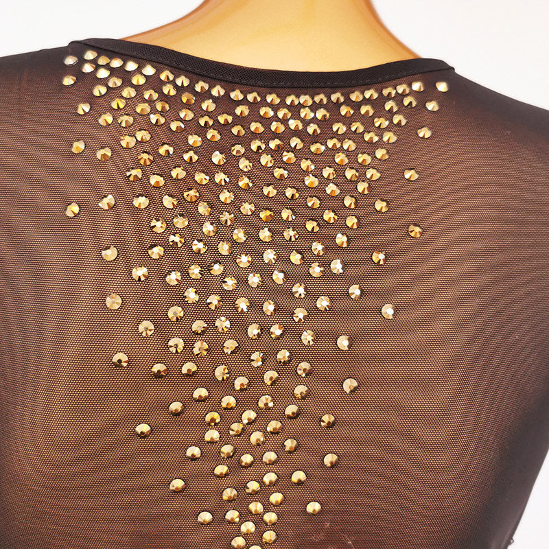 Close view of the gold studs scattered across the sheer mesh back