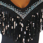 Close view of the sequin fringe under the crystal edged V neckline