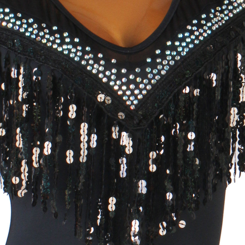 Close view of the sequin fringe under the crystal edged V neckline