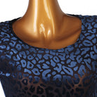 Close view of the burnout leopard pattern at the neckline