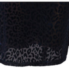 Close view of the sheer mesh band at the hem