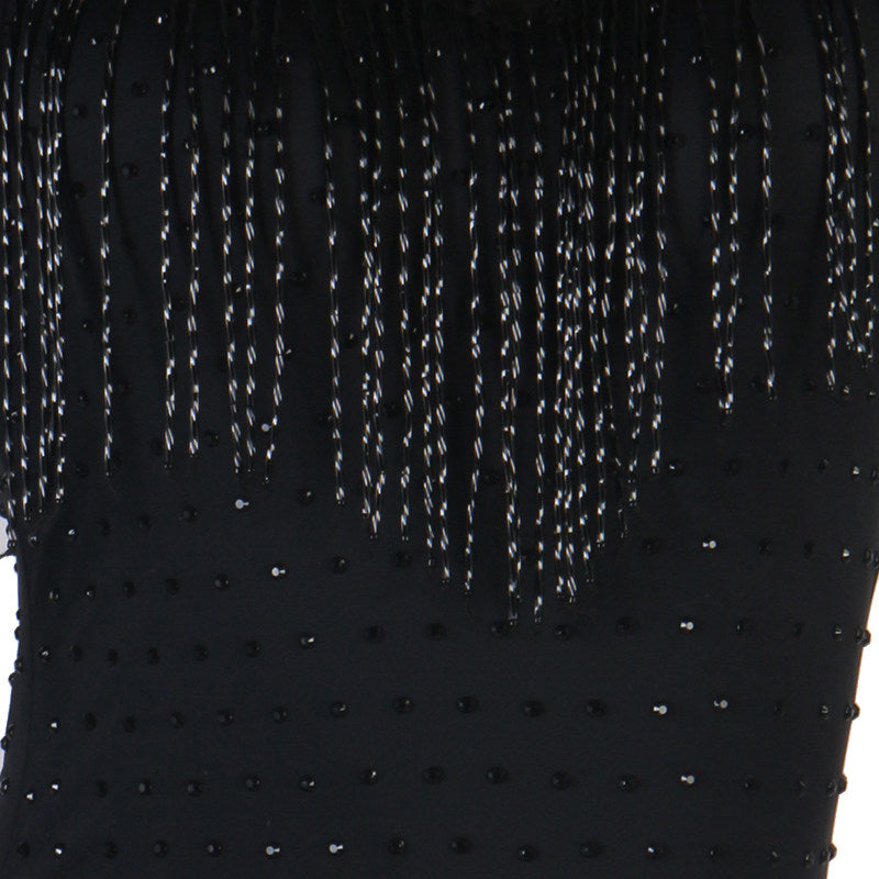 Close view of the beaded fringe strands over the stoned bodice