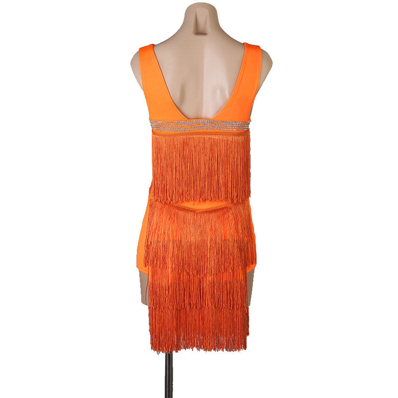 Orange fringe latin dance dress front view with the fringe opening