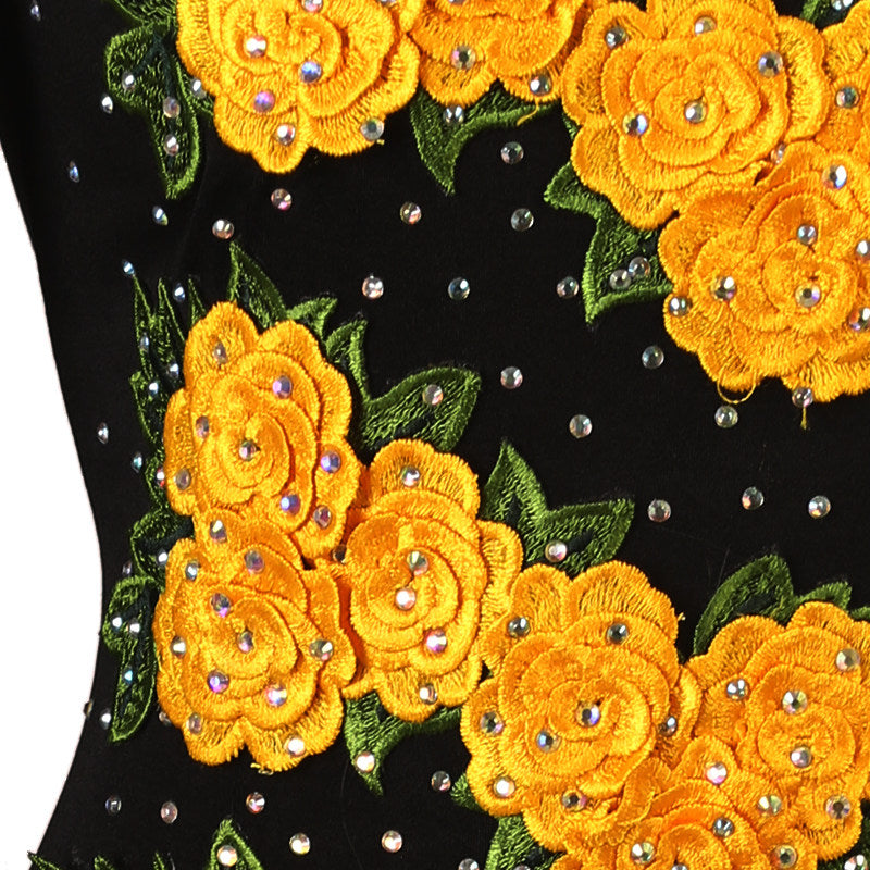 Close view of the raised yellow rose appliques with crystals between