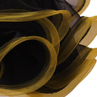 Close view of the gold edged curled organza ruffle layers