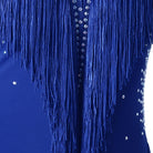 Close view of the blue fringe strands over the crystal scattered fabric