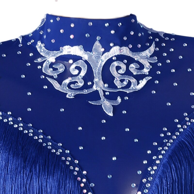 Close view of the silver scroll applique surrounded by crystals