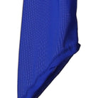 Close view of the blue fluted hem on the flared skirt