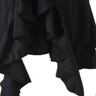 Close view of the narrow pleats in the cascade panel