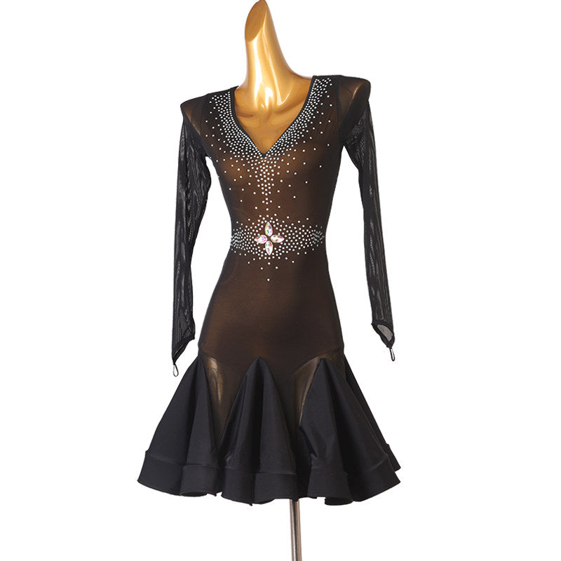 Sheer stone latin dance dress angled view showing the fluted skirt