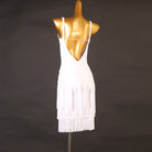 White latin dance dress with ladder strap cutouts and tiered fringe